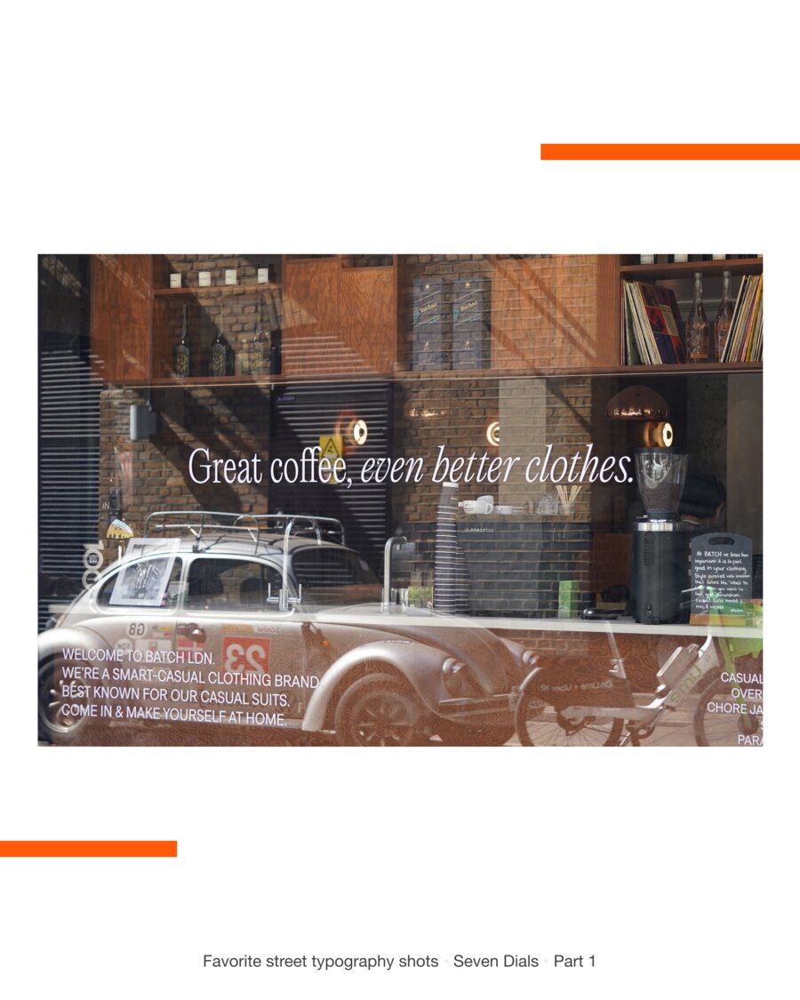 A shop window lettered Great coffee, even better clothes in white script, with a welcome message below it and a vintage car and bicycle reflected in the glass.