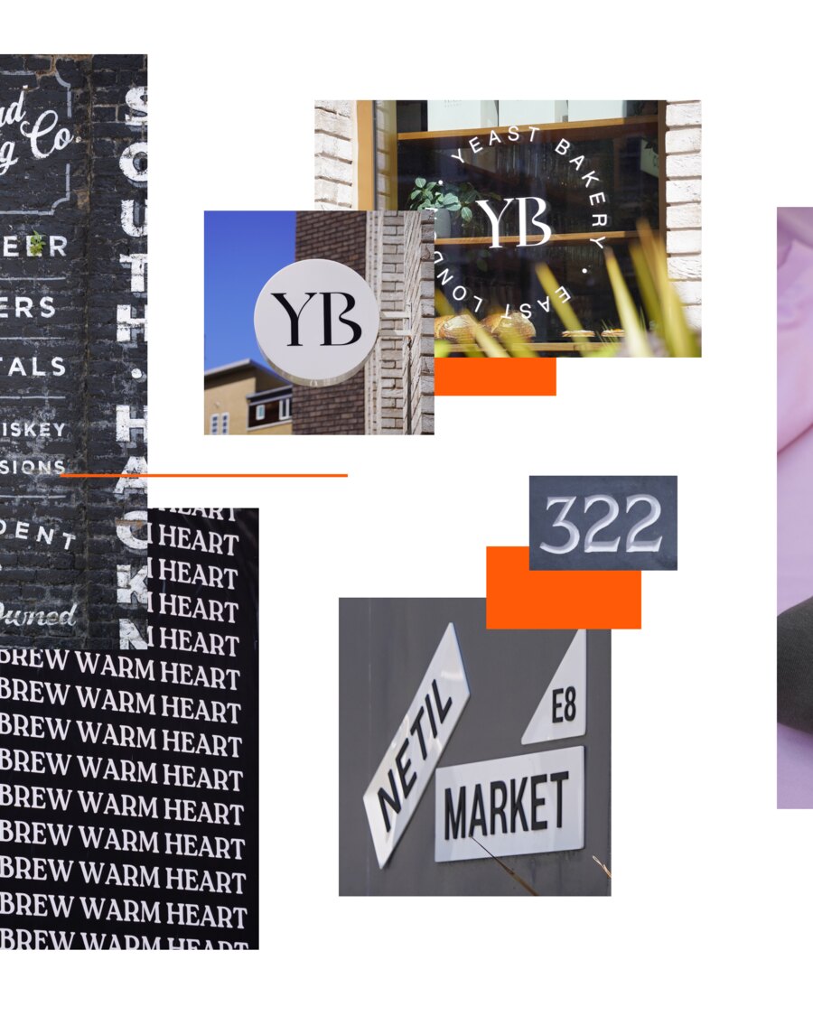 A wall of Hackney lettering: South Hackney painted down black brick above a list reading beer, spirits, whiskey and provisions; a round YB sign and a Yeast Bakery window with its name set in a circle; a cast 322; a Netil Market E8 sign; and a banner repeating Brew Warm Heart.